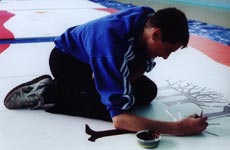 Boy painting Mural
